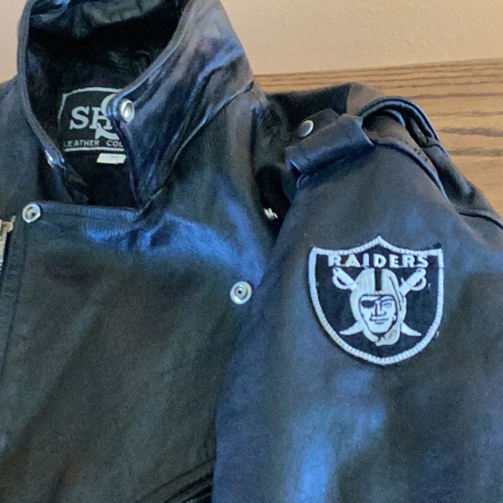 Vintage leather Raiders riding bikers coat